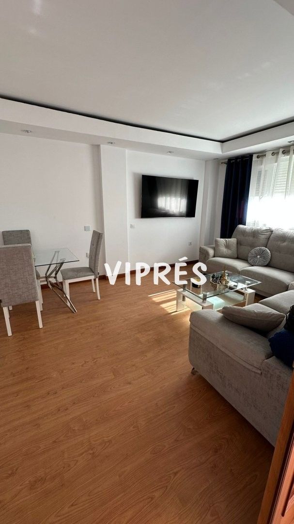 Sala d'estar de Casa adosada en venda en Mérida amb Aire condicionat