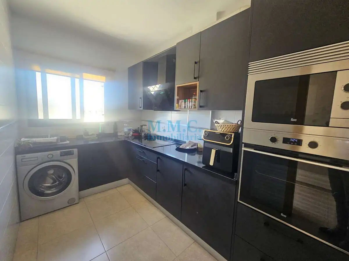 Kitchen of Flat for sale in Roquetas de Mar  with Air Conditioner, Terrace and Furnished