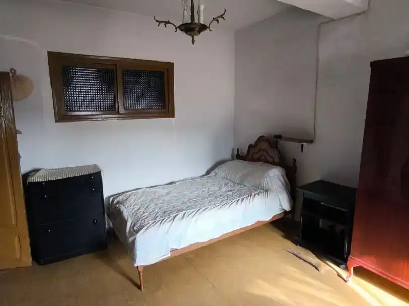 Dormitori de Casa adosada en venda en Medrano amb Moblat i Balcó