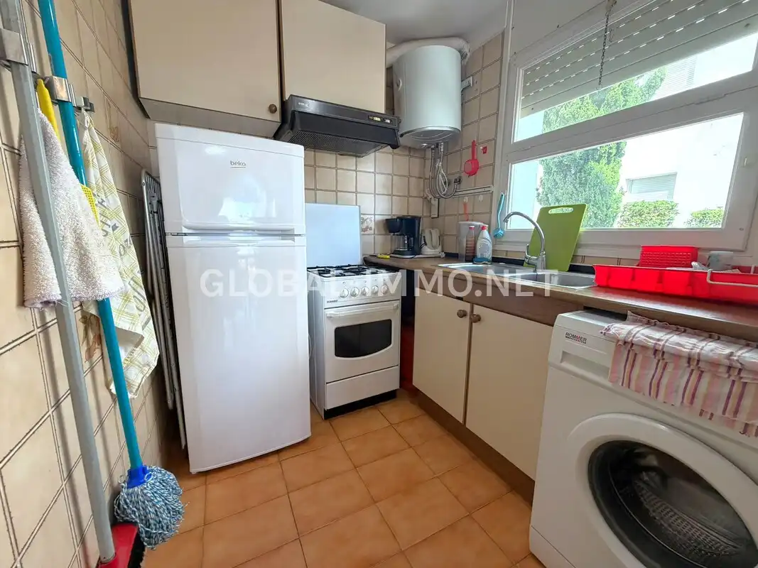 Cuina de Apartament en venda en Roses amb Terrassa, Piscina i Moblat