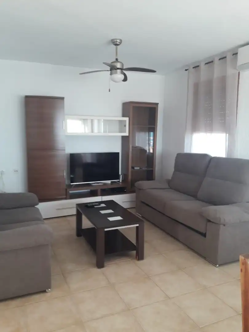 Sala de estar de Casa adosada de alquiler en Almonte con Aire acondicionado, Amueblado y Horno