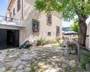 Exterior view of House or chalet for sale in  Madrid Capital  with Air Conditioner, Heating and Private garden