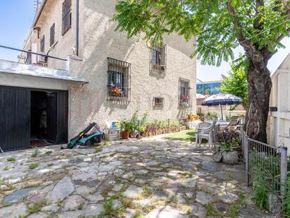 Exterior view of House or chalet for sale in  Madrid Capital  with Air Conditioner, Heating and Private garden
