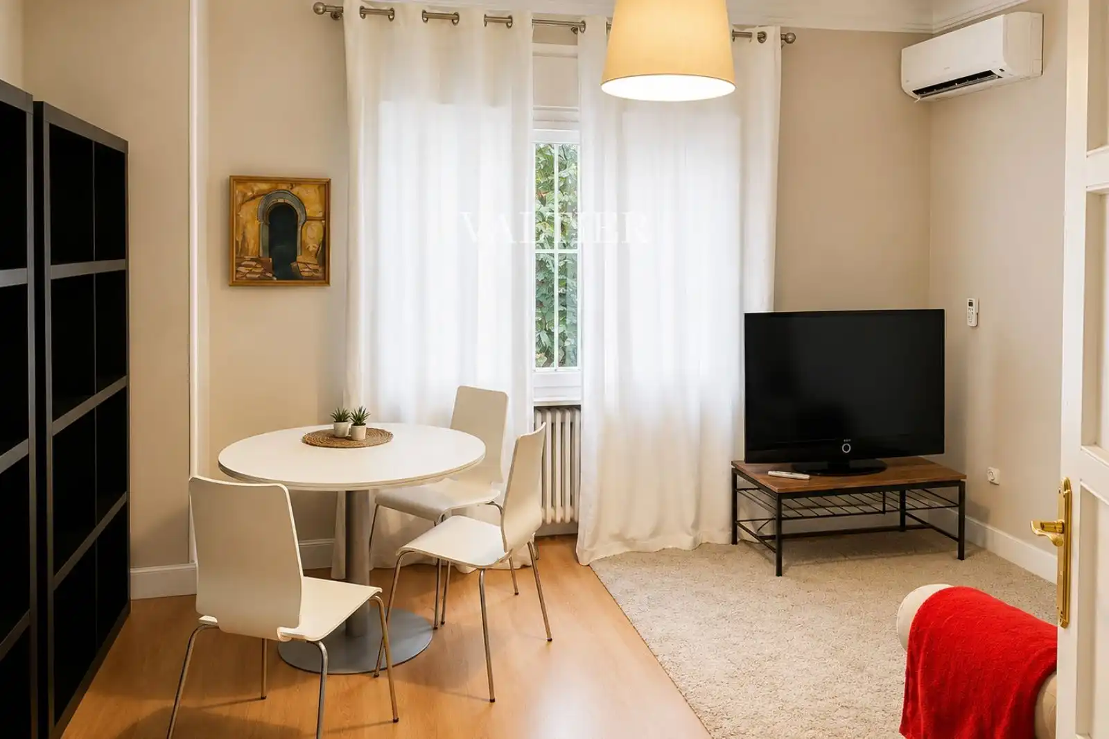 Sala d'estar de Àtic de lloguer en Madrid amb Moblat