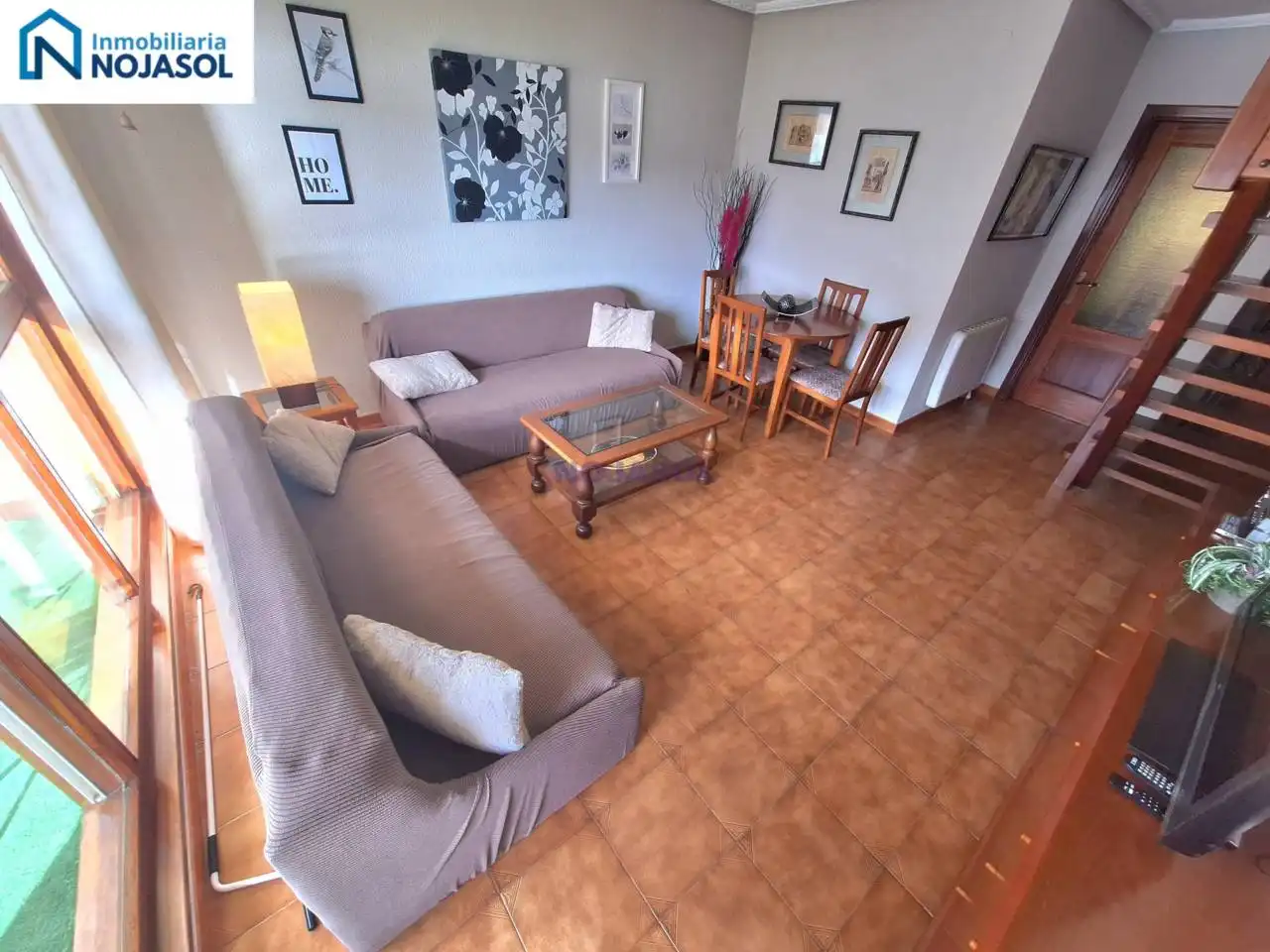 Sala d'estar de Dúplex de lloguer en Noja amb Calefacció, Terrassa i Moblat