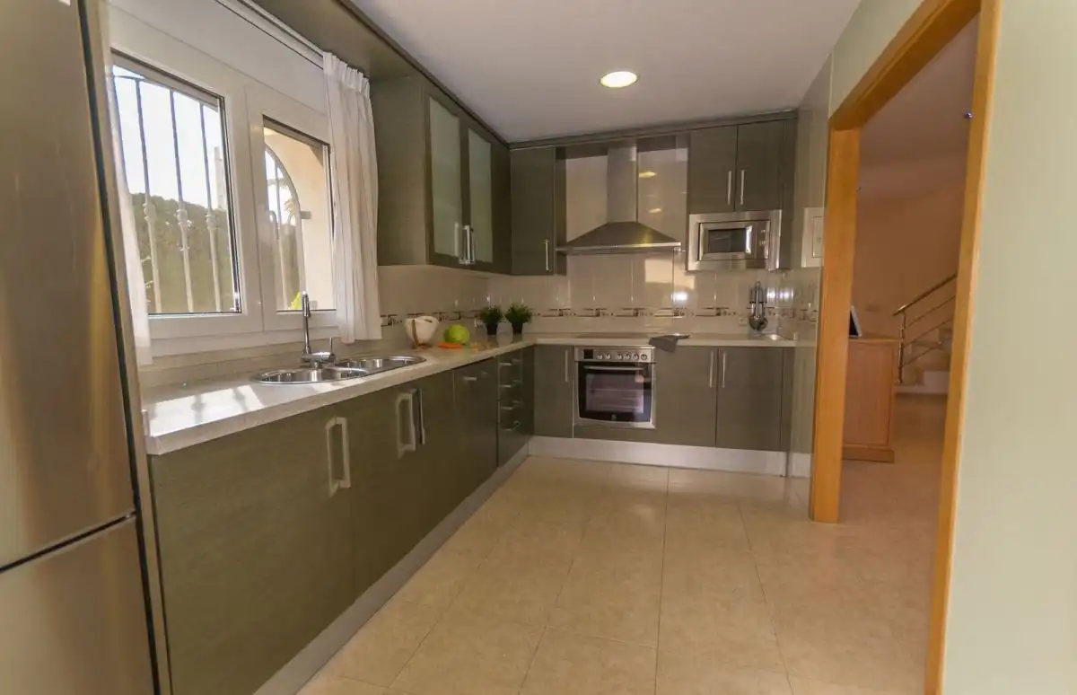 Cocina de Casa o chalet en venta en L'Ampolla con Aire acondicionado, Jardín privado y Terraza