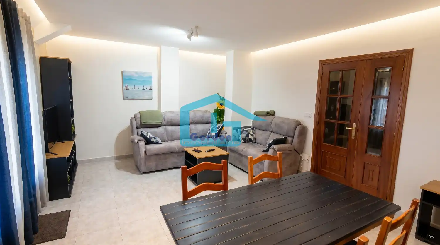 Sala de estar de Ático en venta en Sanxenxo con Calefacción, Terraza y Amueblado