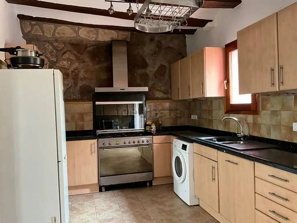 Cuina de Casa o xalet en venda en La Vall de Gallinera amb Calefacció