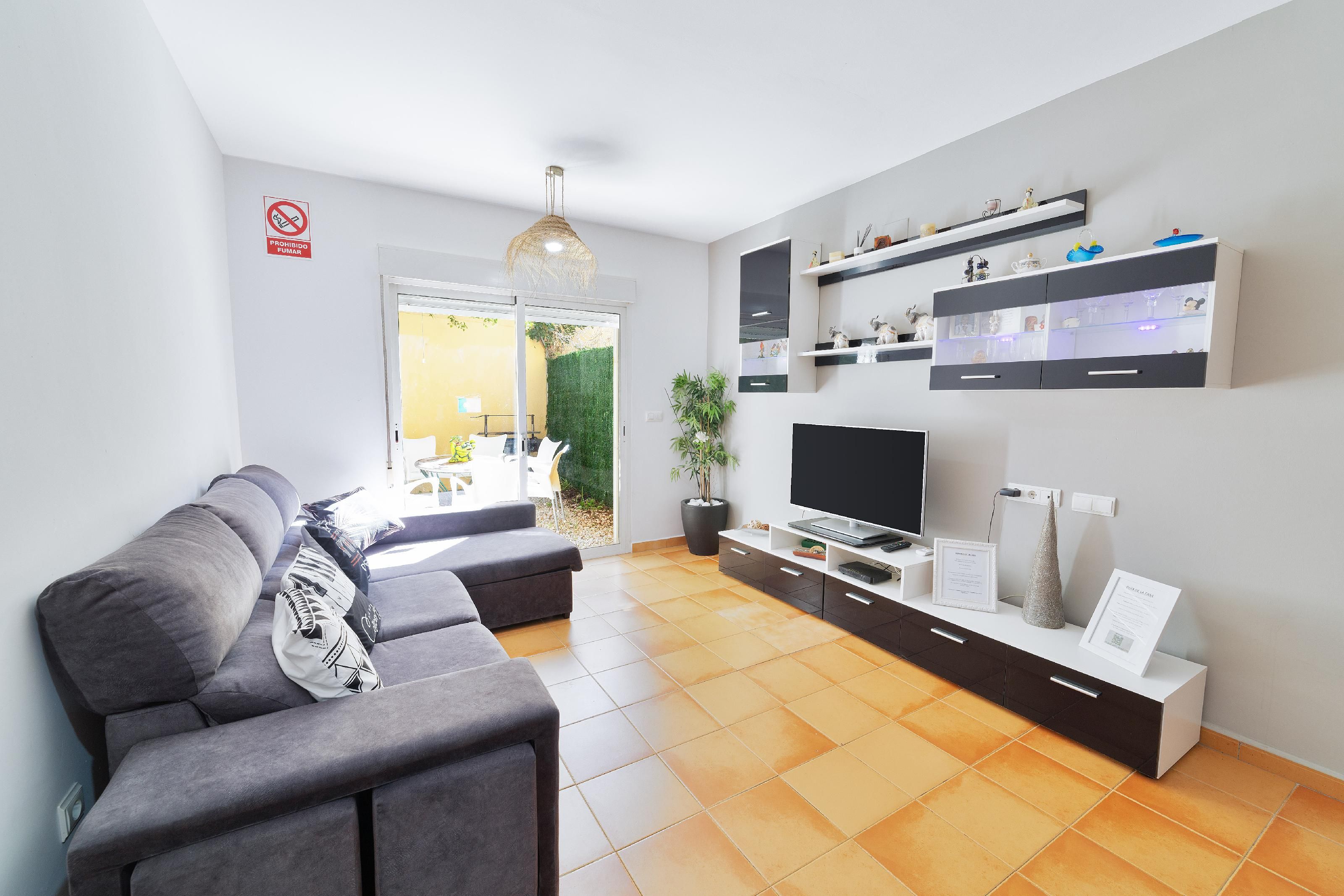 Sala d'estar de Dúplex en venda en Dénia amb Aire condicionat, Calefacció i Jardí privat