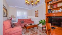 Sala d'estar de Casa adosada en venda en Pulianas amb Aire condicionat, Terrassa i Moblat