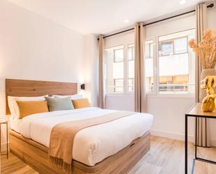 Bedroom of Flat for sale in  Madrid Capital  with Air Conditioner, Furnished and TV