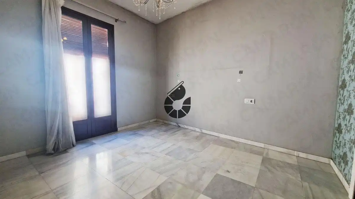 Sala d'estar de Casa adosada en venda en Coria del Río amb Terrassa i Traster
