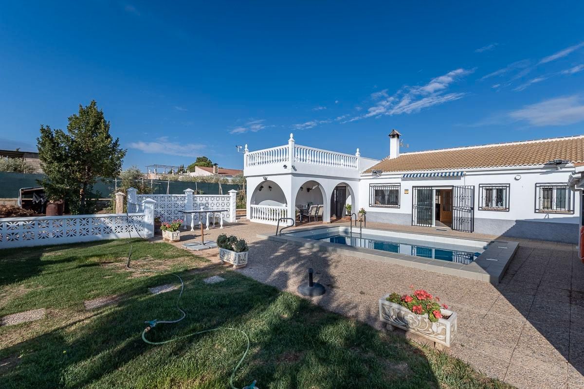 Vista exterior de Casa o xalet en venda en Moraleda de Zafayona amb Aire condicionat, Calefacció i Jardí privat