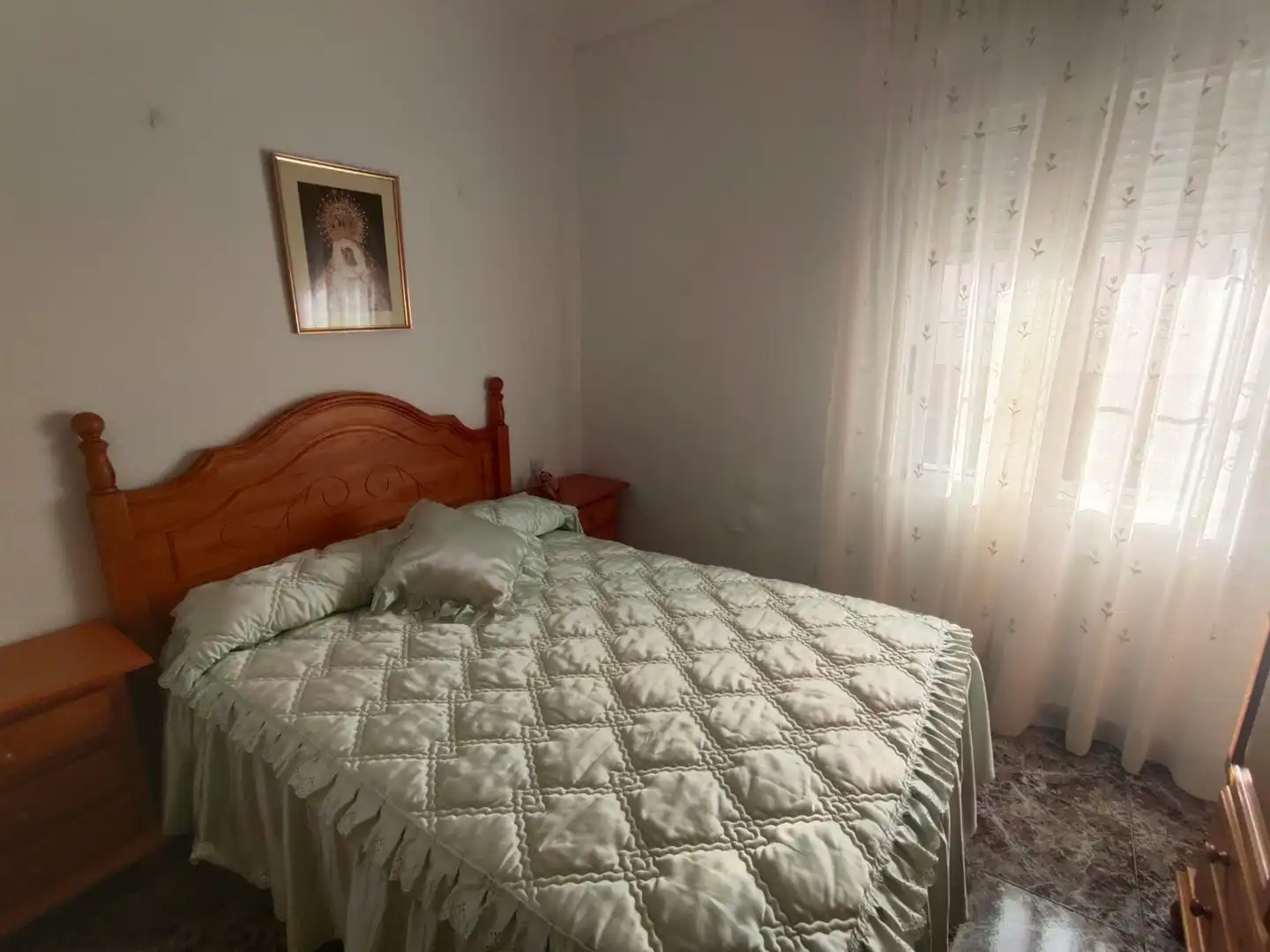 Dormitori de Casa adosada en venda en Guadix amb Moblat