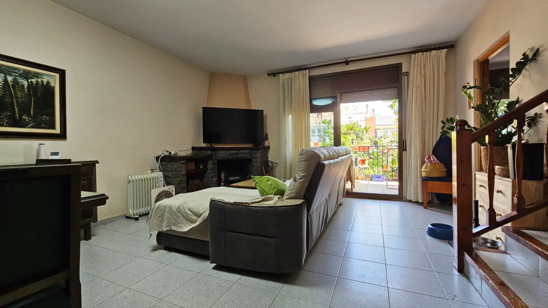 Sala d'estar de Casa adosada en venda en Sabadell amb Calefacció, Terrassa i Forn