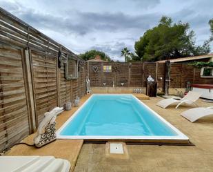 Piscina de Casa o xalet de lloguer en L'Alfàs del Pi amb Aire condicionat, Jardí privat i Terrassa