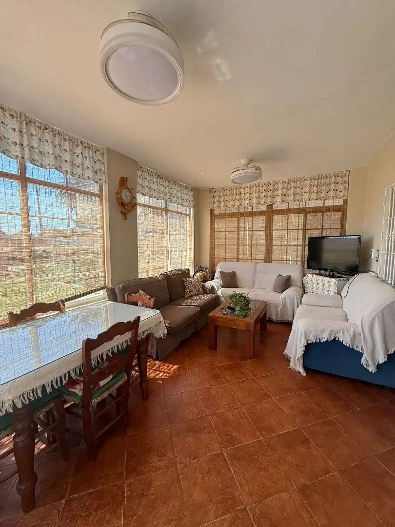 Living room of Houses for sale in El Puerto de Santa María  with Air Conditioner, Private garden and Storage room