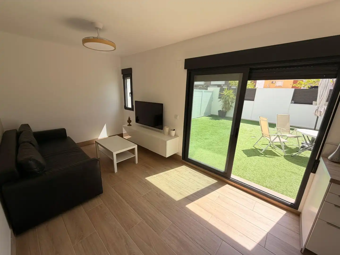 Wohnzimmer von Einfamilien-Reihenhaus zur Miete in Cullera mit Klimaanlage, Heizung und Terrasse