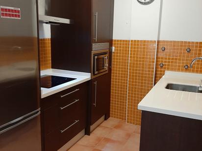 Kitchen of Apartment for sale in Sanlúcar la Mayor  with Air Conditioner and Storage room