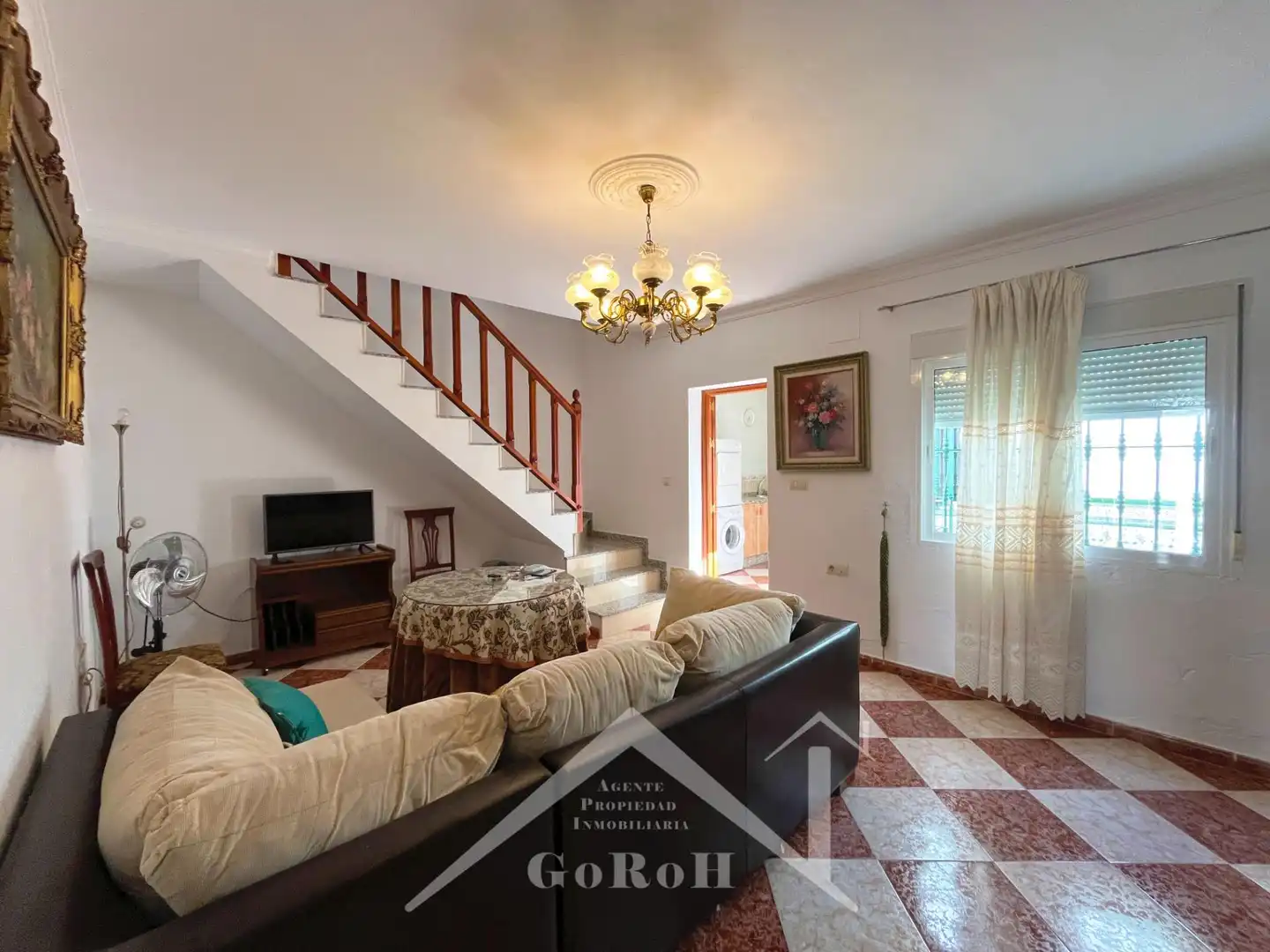 Sala de estar de Casa adosada en venta en Santa Olalla del Cala con Terraza, Trastero y Amueblado