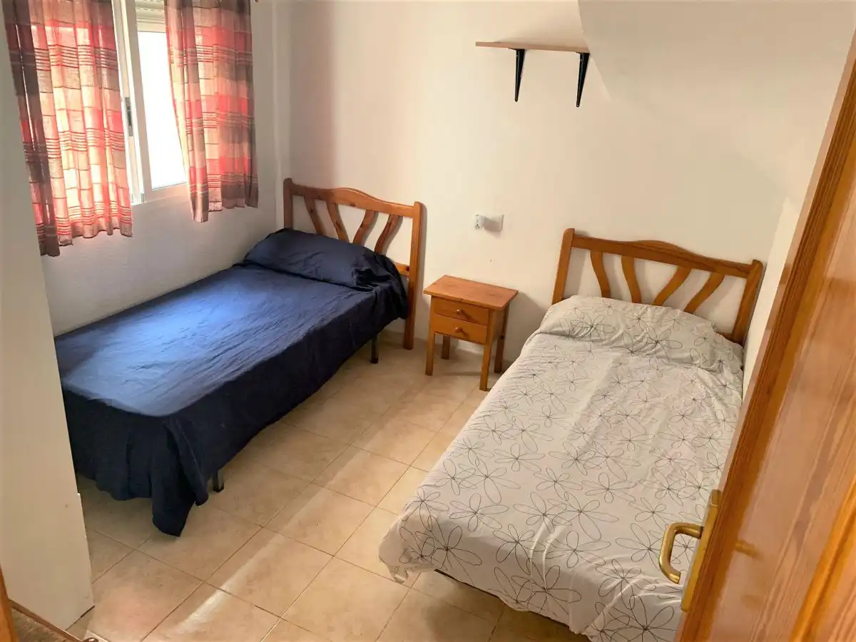 Habitación de Apartamento de alquiler en Orihuela con Terraza y Piscina comunitaria