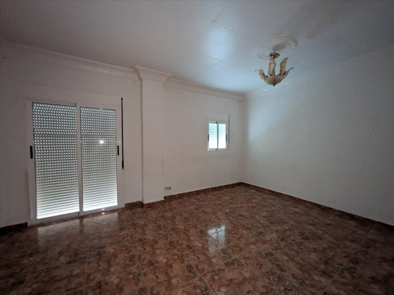 Sala d'estar de Casa adosada en venda en Tortosa