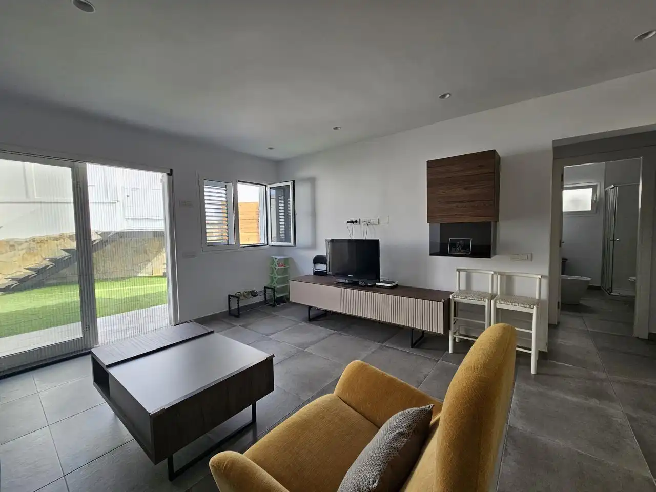 Living room of Houses for rent in Mogán  with Air Conditioner, Private garden and Terrace