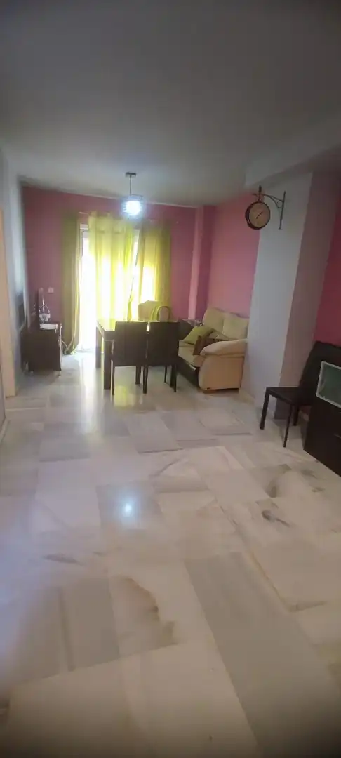 Sala de estar de Casa adosada en venta en Coria del Río con Trastero, Amueblado y Piscina comunitaria