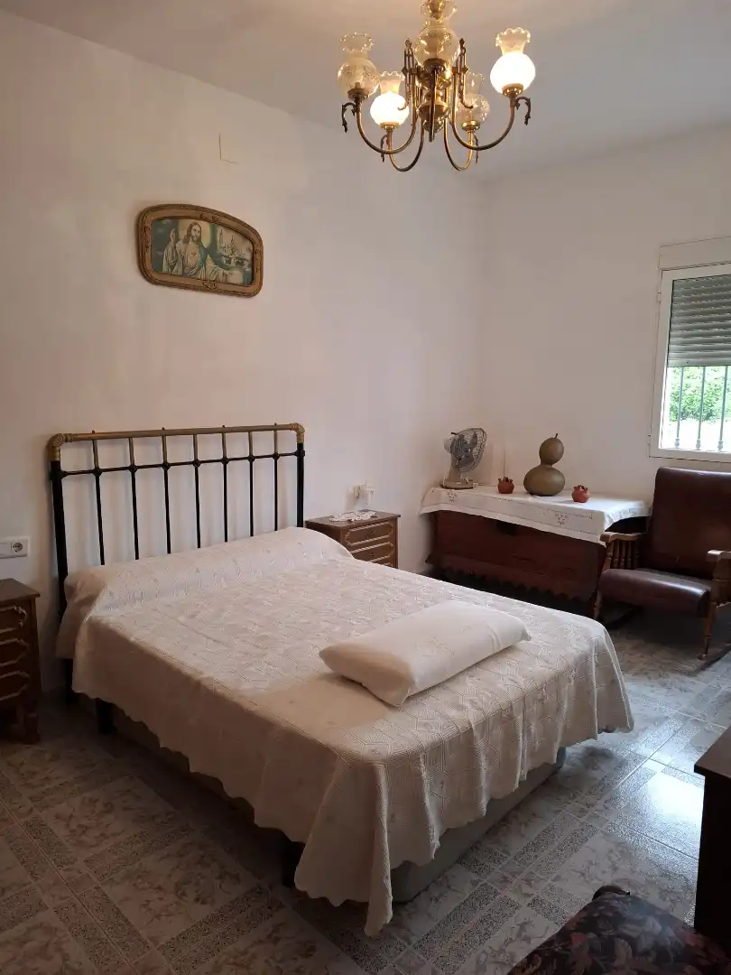 Dormitori de Finca rústica en venda en Fuente de Piedra amb Jardí privat, Piscina i Moblat
