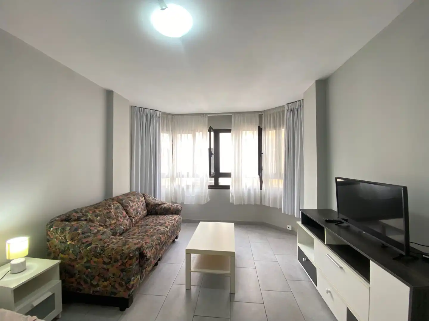 Sala d'estar de Pis de lloguer en Las Palmas de Gran Canaria amb Moblat