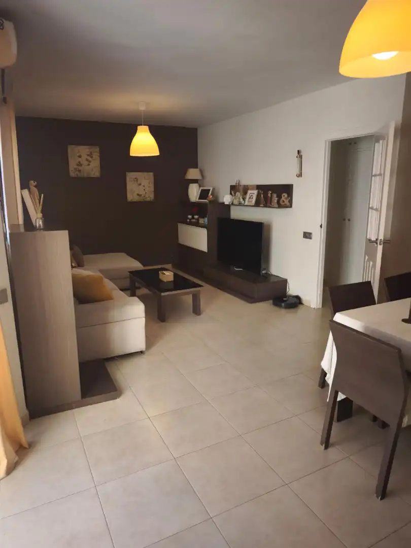 Sala de estar de Casa adosada en venta en Melilla con Aire acondicionado, Jardín privado y Terraza