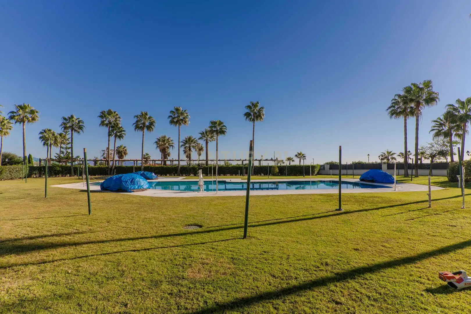 Schwimmbecken von Wohnung zum Verkauf in Manilva mit Privatgarten, Abstellraum und Gemeinschaftspool