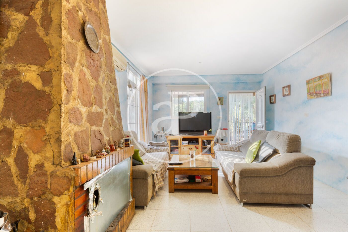 Sala d'estar de Casa o xalet en venda en Sagunto / Sagunt amb Calefacció, Jardí privat i Terrassa