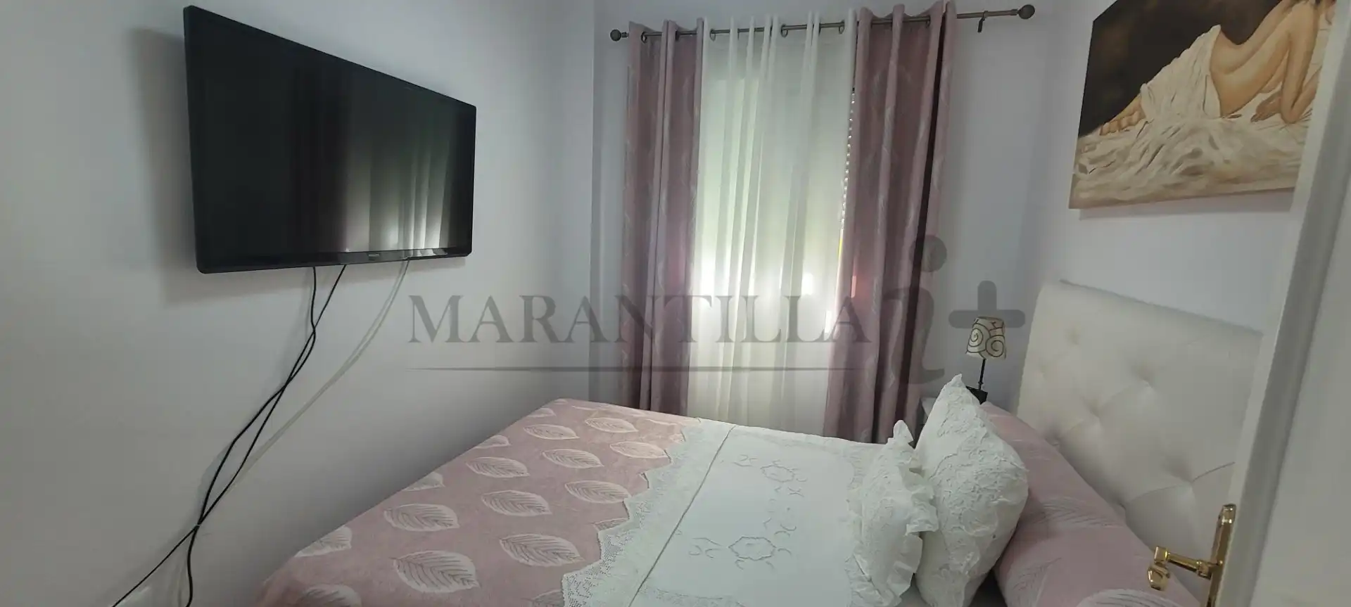 Habitación de Casa adosada en venta en Islantilla con Aire acondicionado, Calefacción y Jardín privado