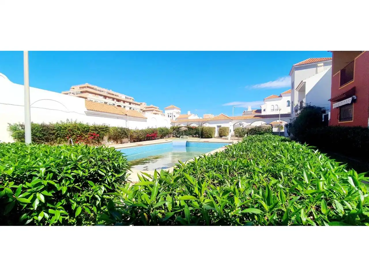 Exterior view of Detached homes for sale in Roquetas de Mar  with Terrace, Furnished and Community pool