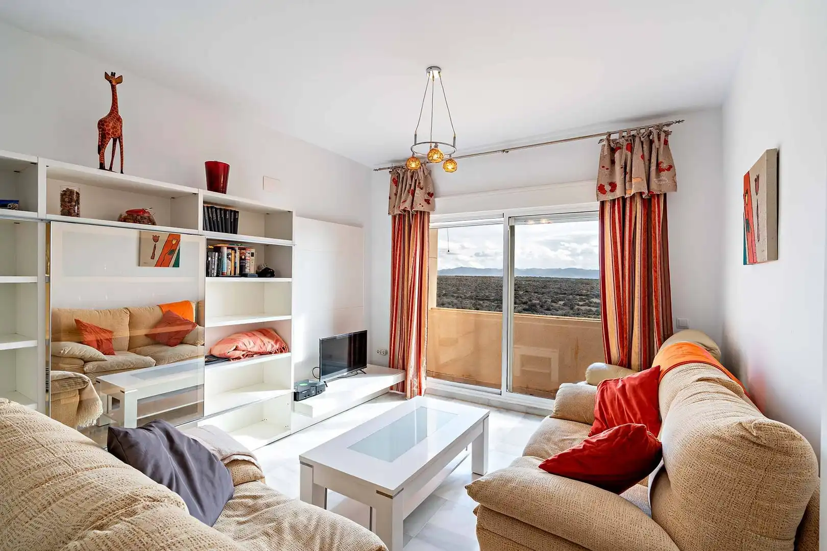 Sala de estar de Piso en venta en Almería con Jardín privado, Terraza y Trastero