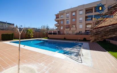 Swimming pool of Flat for sale in  Granada Capital  with Air Conditioner, Heating and Private garden