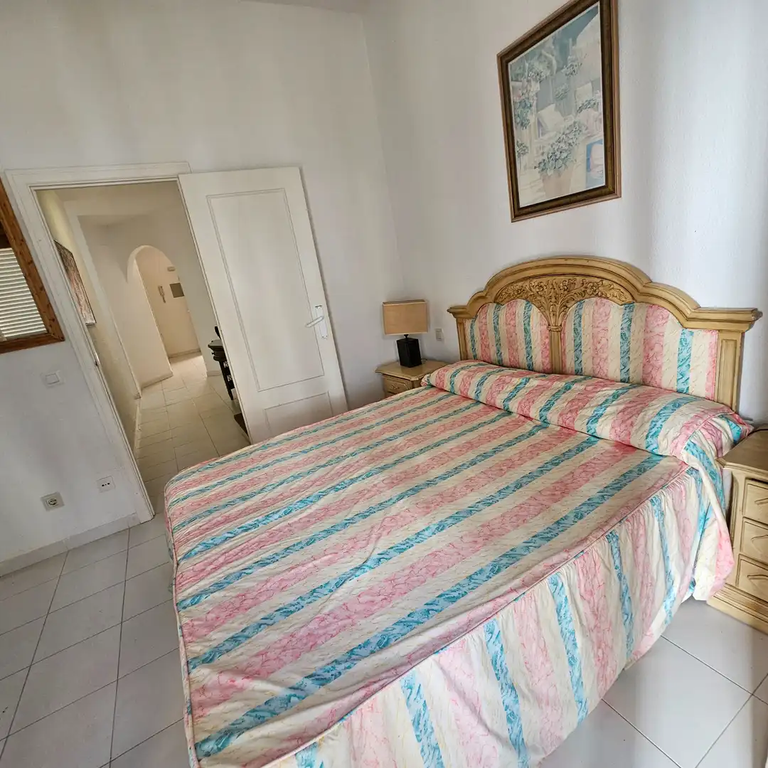 Dormitori de Casa adosada en venda en La Manga del Mar Menor amb Jardí privat, Terrassa i Moblat
