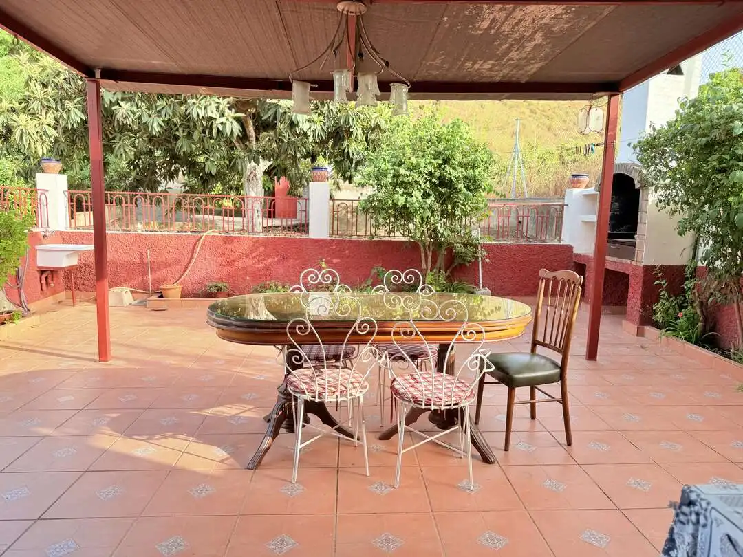 Terrassa de Casa o xalet en venda en Benamocarra amb Jardí privat i Moblat