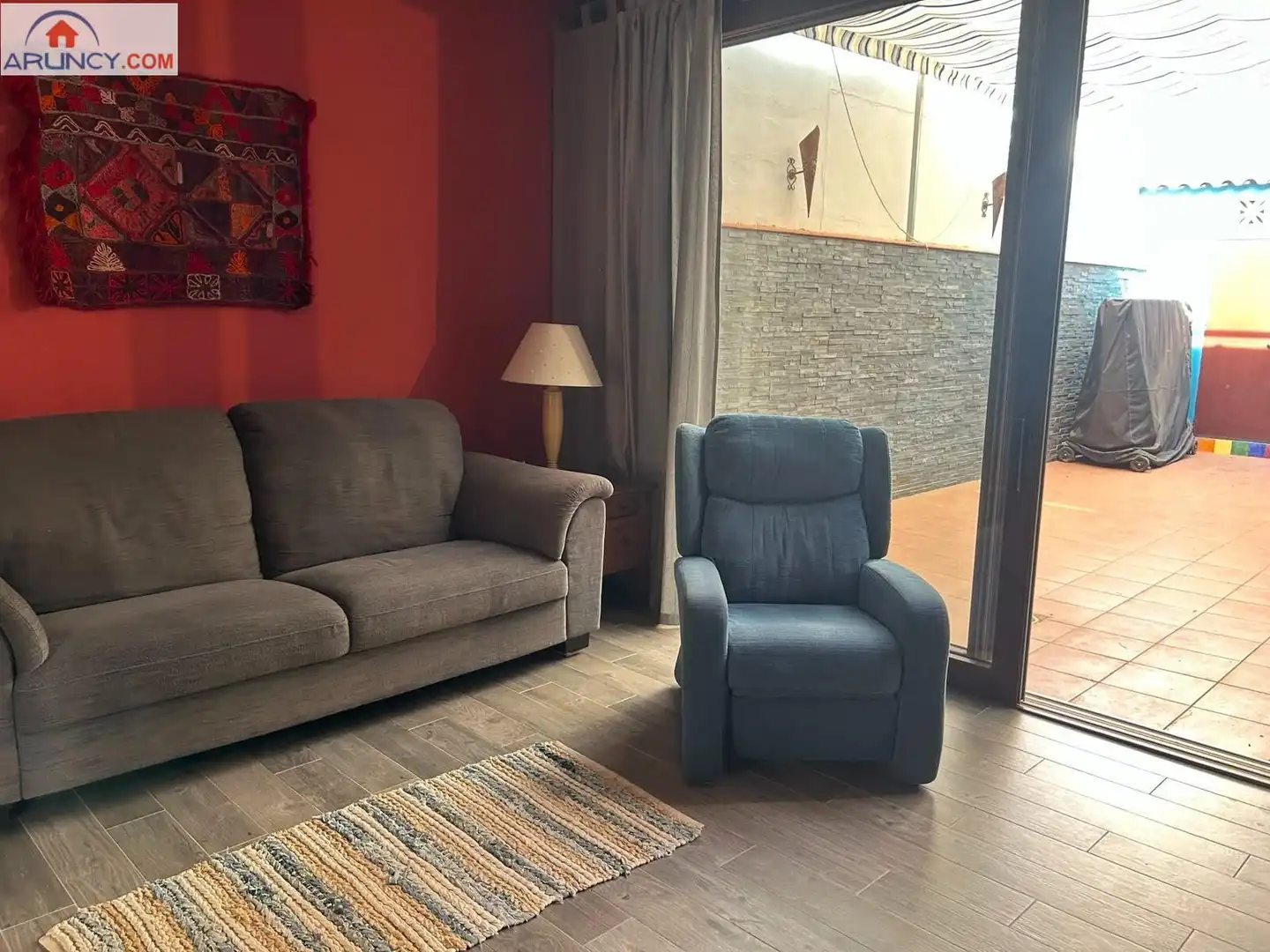 Sala d'estar de Casa adosada de lloguer en Alcalá de Guadaira amb Aire condicionat, Jardí privat i Terrassa