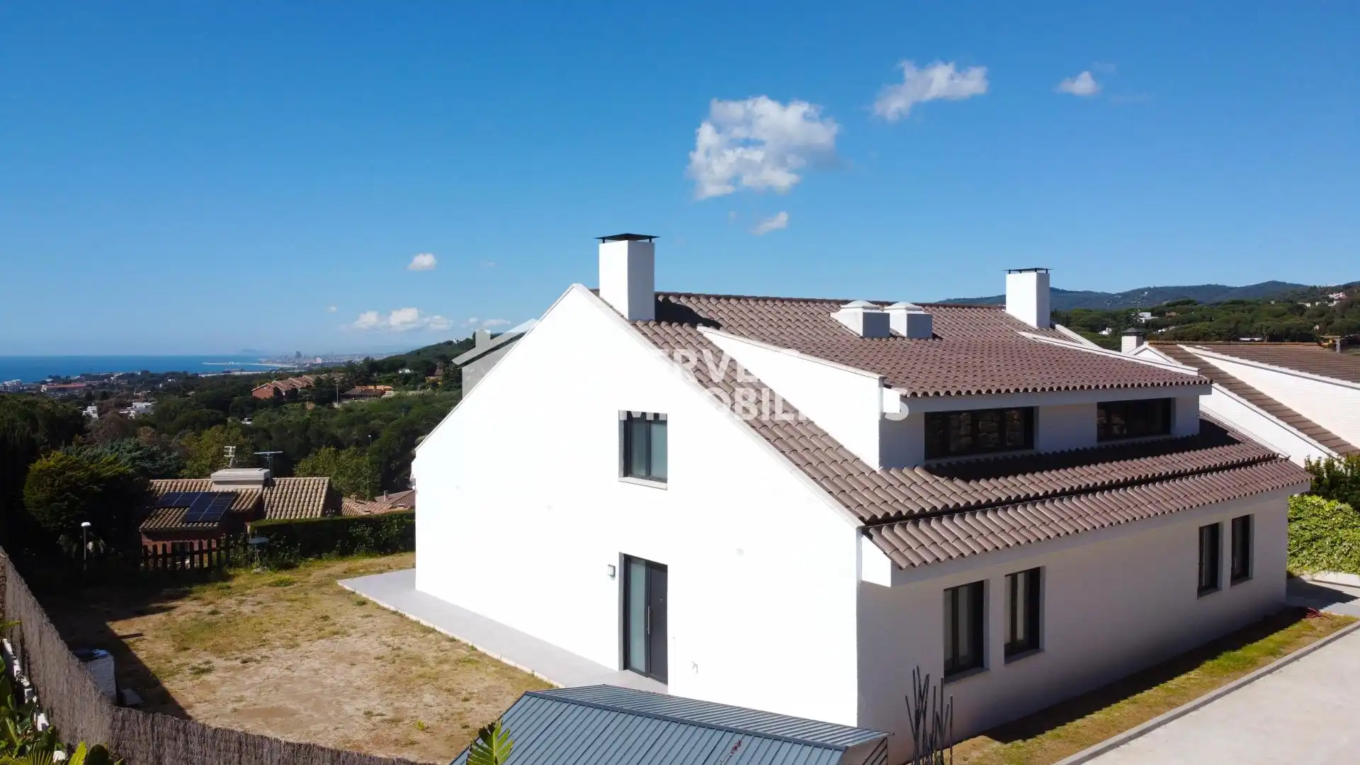 Vista exterior de Casa adosada en venda en Caldes d'Estrac amb Calefacció, Jardí privat i Terrassa