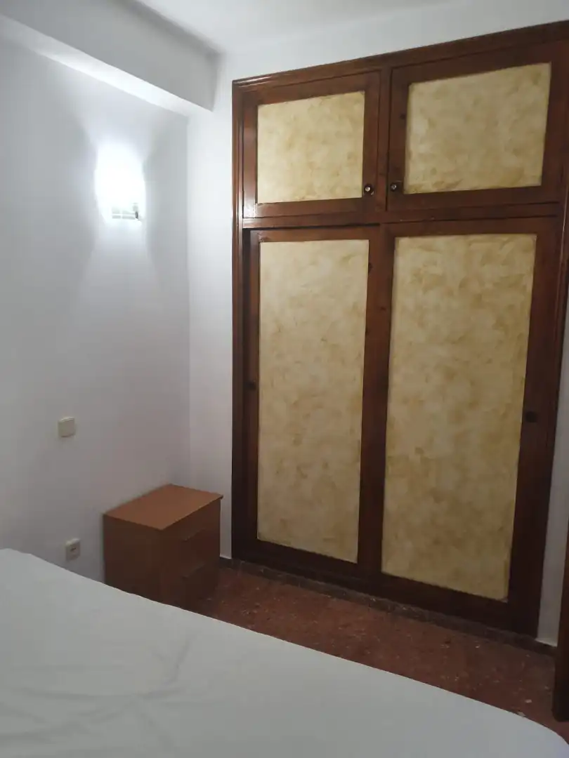 Dormitori de Pis de lloguer en Roquetas de Mar amb Aire condicionat, Calefacció i Jardí privat