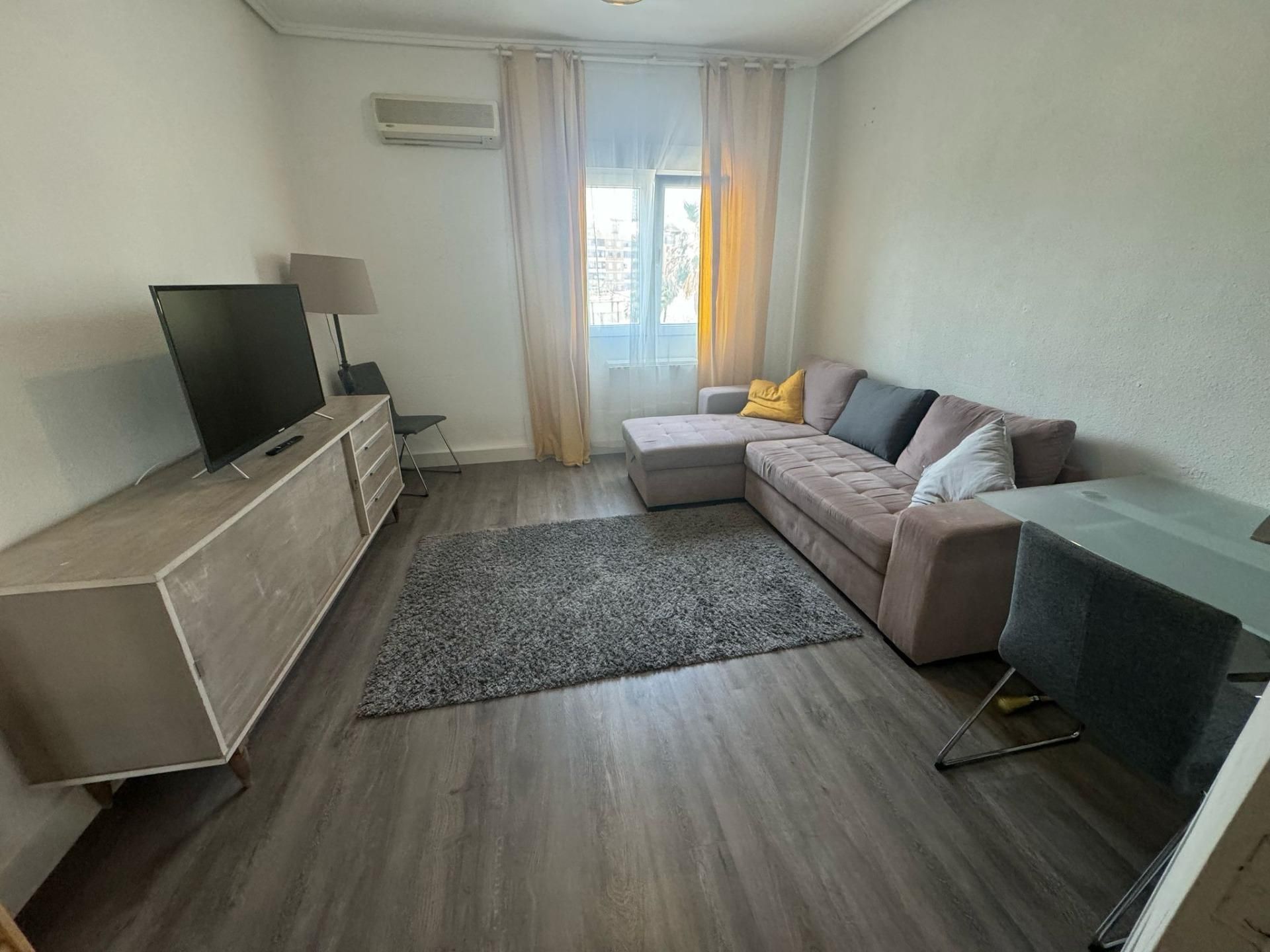Living room of Flat for sale in  Valencia Capital  with Air Conditioner, Private garden and Storage room