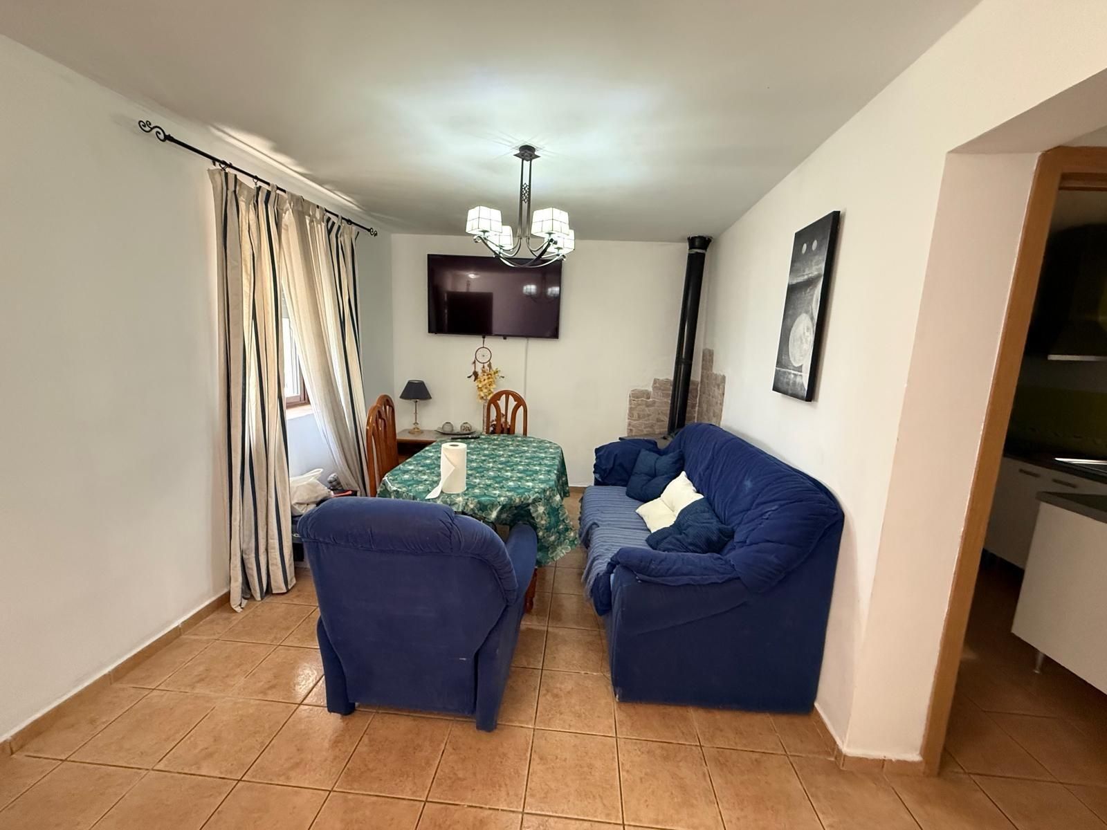 Sala d'estar de Casa adosada en venda en Arriate amb Calefacció, Terrassa i Balcó