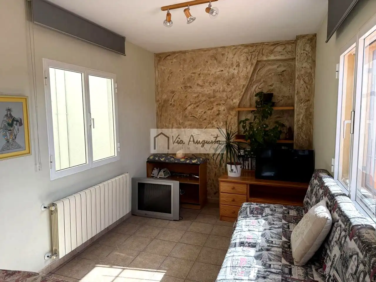 Sala de estar de Casa o chalet en venta en El Perelló con Calefacción, Terraza y Amueblado