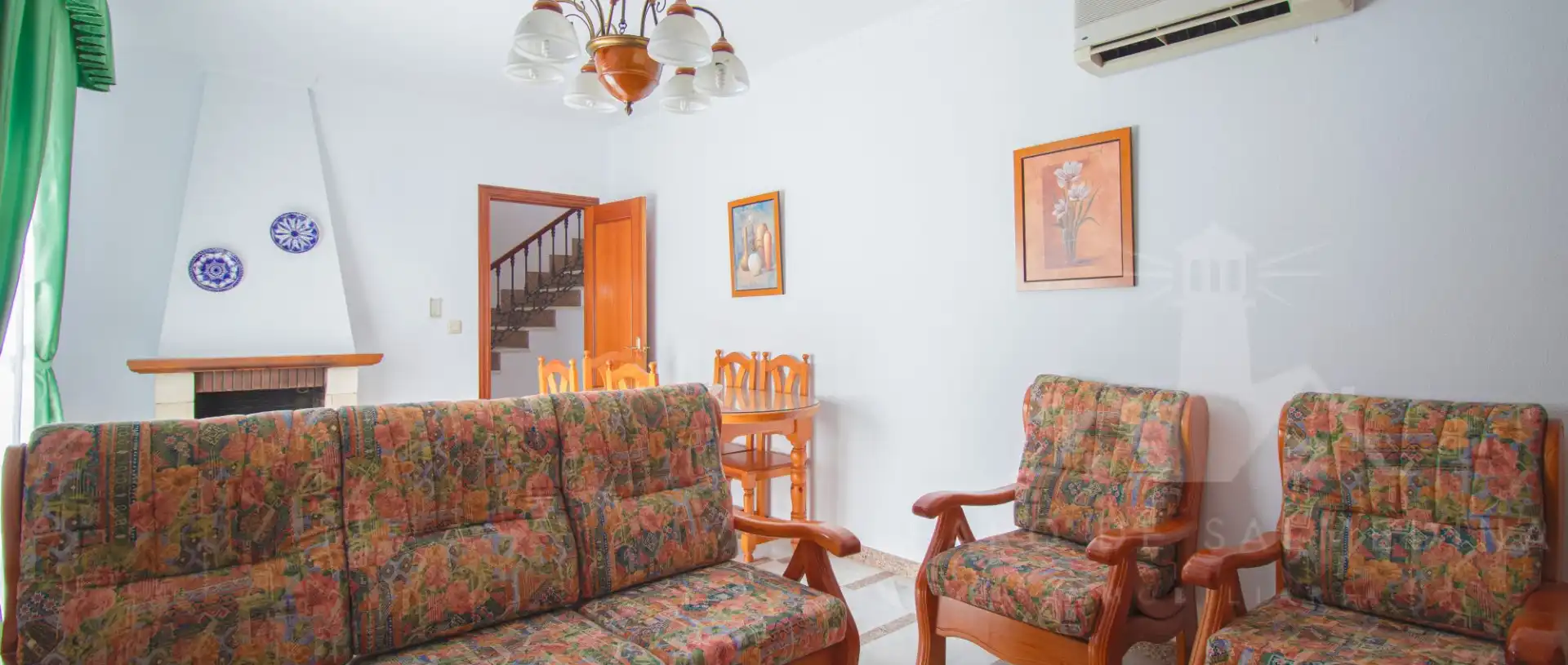 Sala de estar de Casa adosada en venta en Chipiona con Aire acondicionado, Trastero y Amueblado