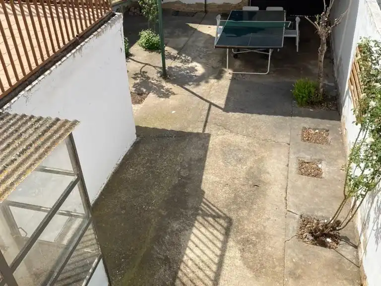 Adossat amb jardí en venda a Calle Nueva 54