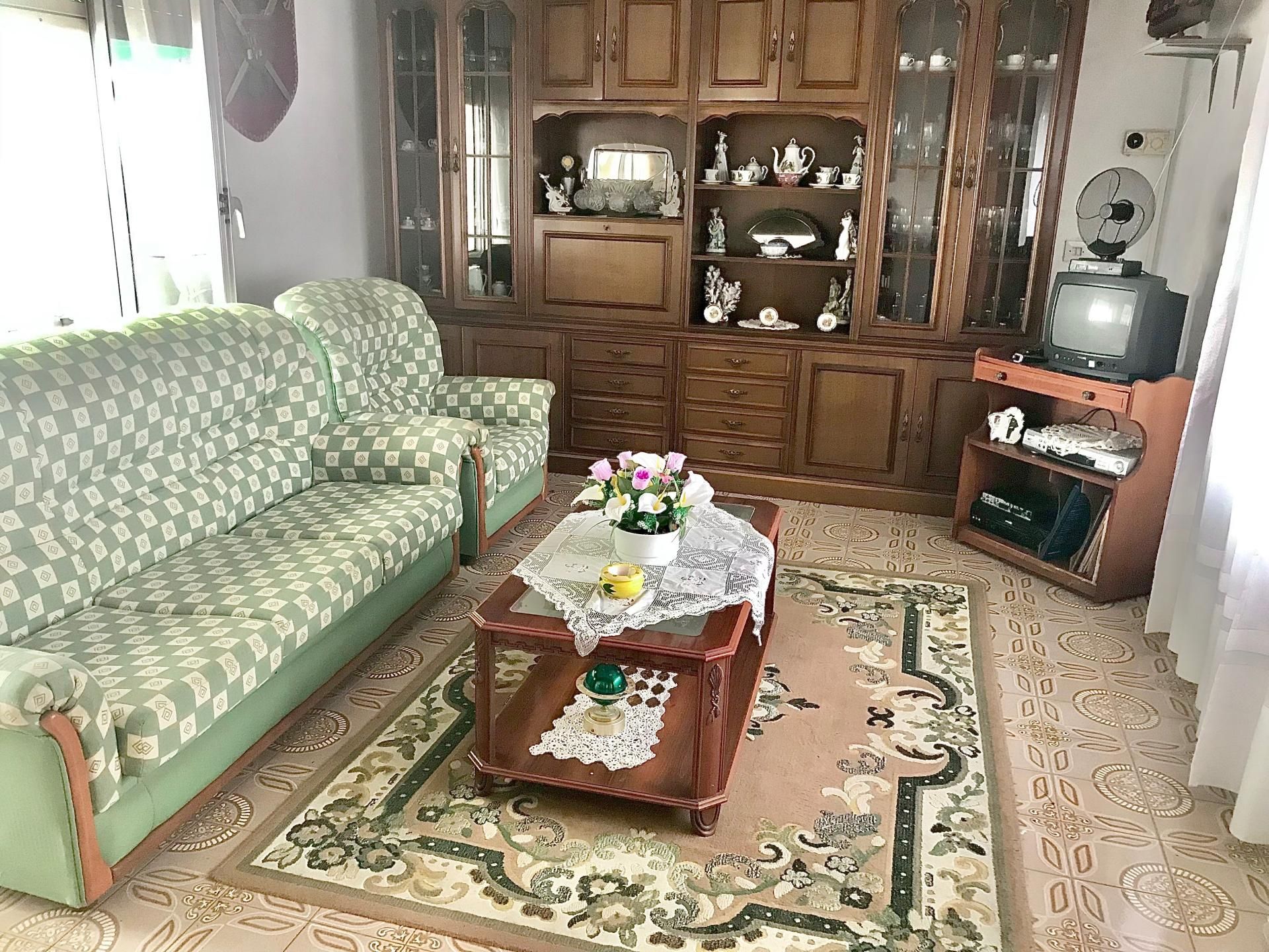 Sala d'estar de Casa adosada en venda en Ribeira amb Calefacció i Terrassa