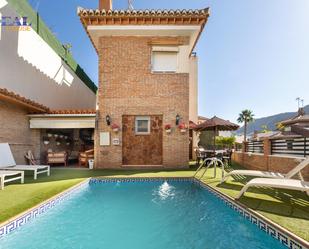 Swimming pool of Single-family semi-detached for sale in  Granada Capital  with Air Conditioner, Heating and Private garden