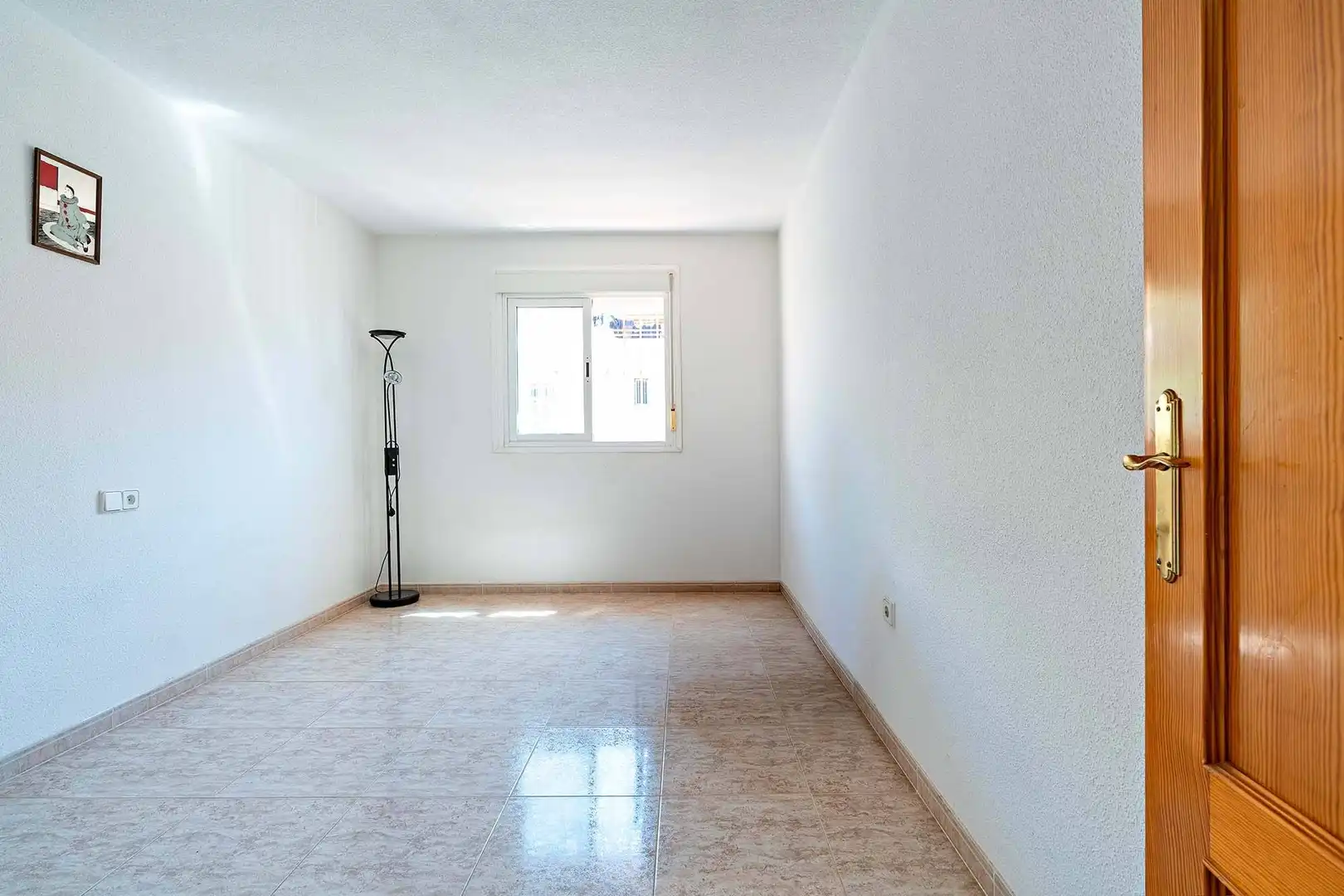 Sala d'estar de Casa adosada en venda en Roquetas de Mar amb Terrassa